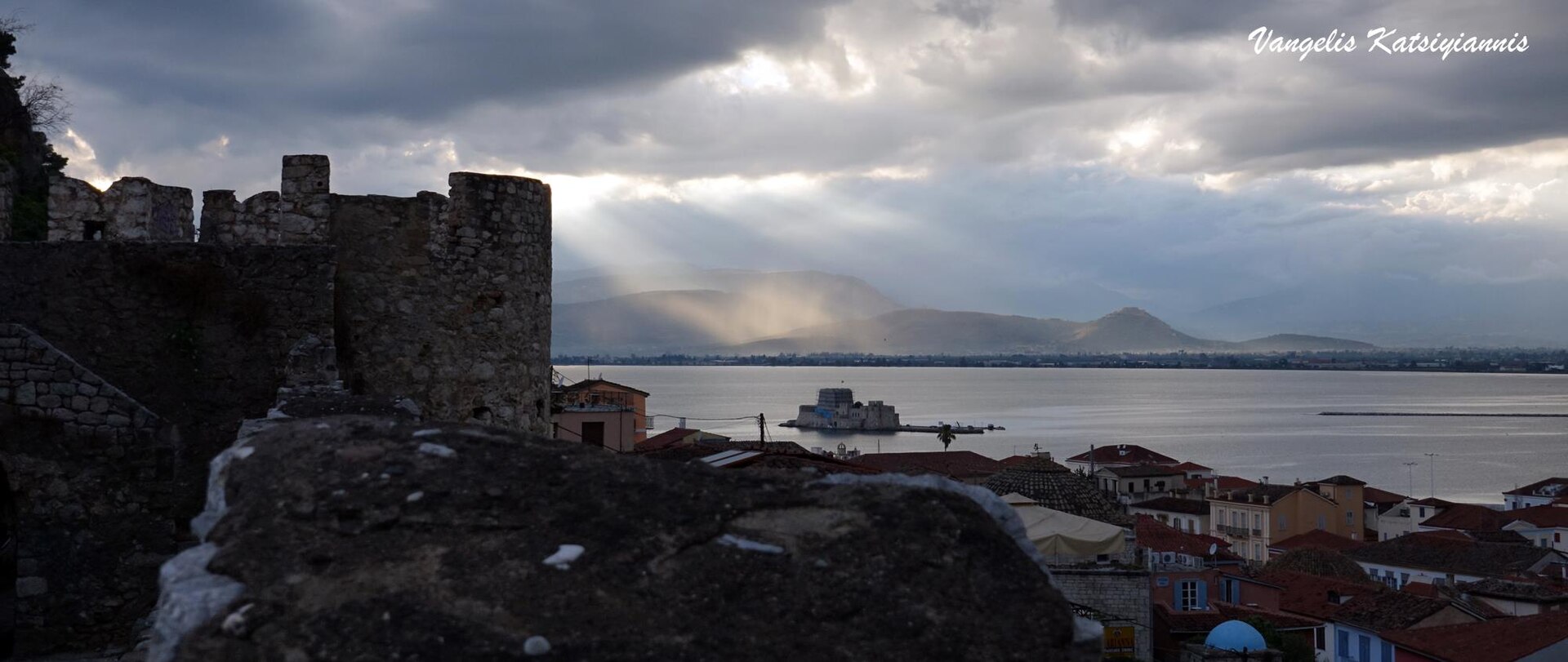 Bourtzi fortress in the blue waters of Nafplio